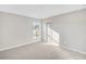 Bright bedroom with large window and door at 112 Laurel Farms Ln, Dallas, GA 30157