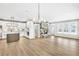 Spacious great room with stone fireplace and hardwood floors at 112 Laurel Farms Ln, Dallas, GA 30157
