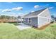 Gray house exterior with stone accents and covered patio at 112 Laurel Farms Ln, Dallas, GA 30157