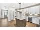 Modern kitchen with island, stainless steel appliances, and white cabinets at 112 Laurel Farms Ln, Dallas, GA 30157