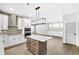 Open concept kitchen boasting an island and stainless steel appliances at 112 Laurel Farms Ln, Dallas, GA 30157