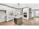 Modern kitchen with white cabinets and an island at 112 Laurel Farms Ln, Dallas, GA 30157