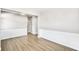 Open living space with wood floors, detailed trim, and a clean, minimalist aesthetic at 112 Laurel Farms Ln, Dallas, GA 30157