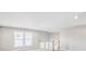 Spacious loft area with a large window at 112 Laurel Farms Ln, Dallas, GA 30157