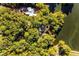 Bird's-eye view of home and lakefront property at 8316 Hewlett Rd, Sandy Springs, GA 30350