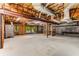 Unfinished basement garage area with ample space at 8316 Hewlett Rd, Sandy Springs, GA 30350