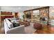 Finished basement with stone fireplace and comfortable seating area at 8316 Hewlett Rd, Sandy Springs, GA 30350