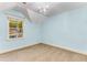 Light and airy bedroom with a window and neutral walls at 8316 Hewlett Rd, Sandy Springs, GA 30350