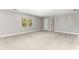 Serene bedroom with plush carpeting and chandelier at 8316 Hewlett Rd, Sandy Springs, GA 30350