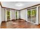 Bright bedroom with hardwood floors and lake view at 8316 Hewlett Rd, Sandy Springs, GA 30350