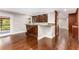 Breakfast bar with granite countertop and custom cabinetry at 8316 Hewlett Rd, Sandy Springs, GA 30350