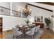 Spacious dining room with hardwood floors, chandelier, and modern decor at 8316 Hewlett Rd, Sandy Springs, GA 30350