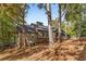 Ranch home nestled in woods with large deck at 8316 Hewlett Rd, Sandy Springs, GA 30350