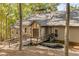 Lakefront home with unique stonework accents at 8316 Hewlett Rd, Sandy Springs, GA 30350