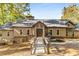 Inviting lakefront home with a walkway at 8316 Hewlett Rd, Sandy Springs, GA 30350