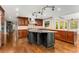 Kitchen features an island, stainless steel appliances, and hardwood floors at 8316 Hewlett Rd, Sandy Springs, GA 30350