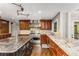 Large kitchen boasts granite countertops, stainless steel appliances, and ample cabinet space at 8316 Hewlett Rd, Sandy Springs, GA 30350
