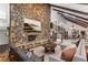 Living room features a stone fireplace and hardwood floors at 8316 Hewlett Rd, Sandy Springs, GA 30350