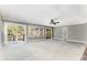 Large living room with sliding glass doors and view at 8316 Hewlett Rd, Sandy Springs, GA 30350