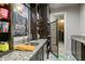 Well-stocked basement bar with wine fridge and sink at 443 Wimbledon Ne Rd, Atlanta, GA 30324