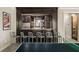 Basement wet bar with wine cooler and ample storage at 443 Wimbledon Ne Rd, Atlanta, GA 30324