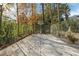 Private backyard basketball court with chain link fence at 443 Wimbledon Ne Rd, Atlanta, GA 30324