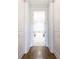 Elegant bathroom with soaking tub, walk-in shower, and herringbone tile floor at 443 Wimbledon Ne Rd, Atlanta, GA 30324