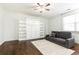 Bright bedroom with a built-in Murphy bed and plenty of shelving at 443 Wimbledon Ne Rd, Atlanta, GA 30324