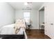 Bright bedroom with built-in workspace and hardwood floors at 443 Wimbledon Ne Rd, Atlanta, GA 30324