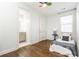 Cozy bedroom with hardwood floors and a ceiling fan at 443 Wimbledon Ne Rd, Atlanta, GA 30324