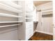 Large walk-in closet with ample shelving and drawers at 443 Wimbledon Ne Rd, Atlanta, GA 30324