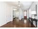 Light-filled entryway, hardwood floors, and views to other rooms at 443 Wimbledon Ne Rd, Atlanta, GA 30324