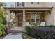 Inviting front porch with stonework and comfortable seating at 443 Wimbledon Ne Rd, Atlanta, GA 30324