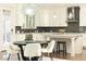 Modern kitchen with white cabinets, quartz countertops, and stainless steel appliances at 443 Wimbledon Ne Rd, Atlanta, GA 30324