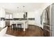 Modern kitchen with white cabinets, stainless steel appliances, and hardwood floors at 443 Wimbledon Ne Rd, Atlanta, GA 30324