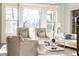 Spacious living room with ample natural light and comfortable seating at 443 Wimbledon Ne Rd, Atlanta, GA 30324