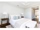 Luxurious main bedroom with hardwood floors, a neutral color scheme and ensuite bath at 443 Wimbledon Ne Rd, Atlanta, GA 30324