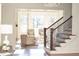 Elegant staircase and entryway with hardwood floors at 443 Wimbledon Ne Rd, Atlanta, GA 30324