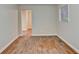 Hardwood floor bonus room with access to another area at 5164 Phillips Dr, Forest Park, GA 30297