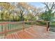 Wooden deck overlooks a wooded backyard at 5164 Phillips Dr, Forest Park, GA 30297