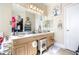 Bright bathroom with dual sinks, decorative vanity, and plenty of counter space at 374 Cherington Ln, Lawrenceville, GA 30044