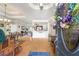 Inviting foyer featuring a decorative door, hardwood floors, and views of the dining and living areas at 374 Cherington Ln, Lawrenceville, GA 30044