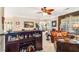 Spacious living area featuring a bar, leather furniture, and cozy seating at 374 Cherington Ln, Lawrenceville, GA 30044