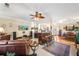 Inviting living area featuring a bar, leather furniture, and an open layout perfect for entertaining at 374 Cherington Ln, Lawrenceville, GA 30044