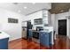 Eat-in kitchen featuring stainless steel appliances, custom cabinetry and hardwood floors at 3324 Peachtree Ne Rd # 1813, Atlanta, GA 30326