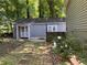 Charming backyard with stone path and storage shed at 2832 Jordan Forest Nw Trl, Lawrenceville, GA 30044