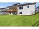 Elevated deck and backyard with green grass at 2023 Fern Mountain Ln, Marietta, GA 30064