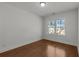 Bright bedroom with hardwood floors and window at 2023 Fern Mountain Ln, Marietta, GA 30064