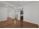 Dining room features hardwood floors and a chandelier at 2023 Fern Mountain Ln, Marietta, GA 30064