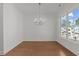 Spacious dining room with hardwood floors and a chandelier at 2023 Fern Mountain Ln, Marietta, GA 30064